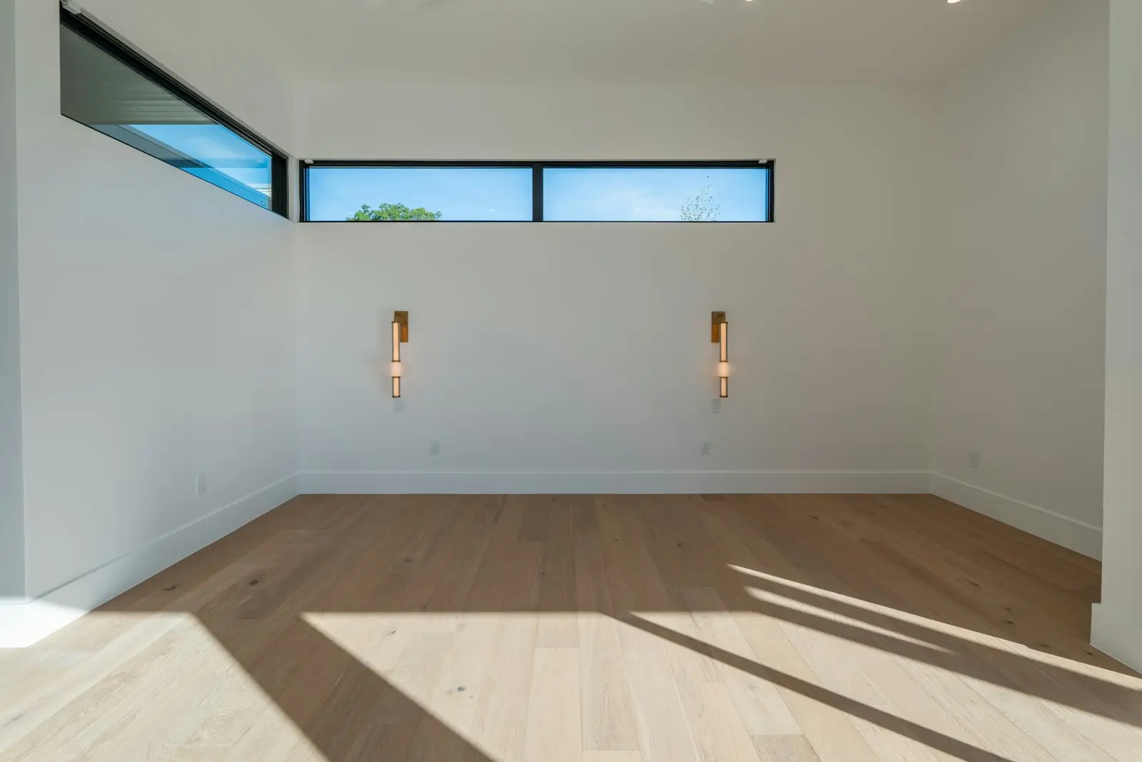 A bright room with smooth white walls and ceiling